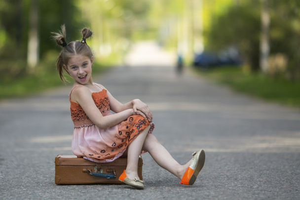 Little girl with suitcase  - Photo, Image