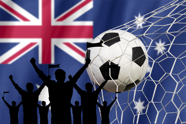 σιλουέτες των οπαδών ποδοσφαίρου με τη σημαία της Australia.Cheer έννοιας - Φωτογραφία, εικόνα