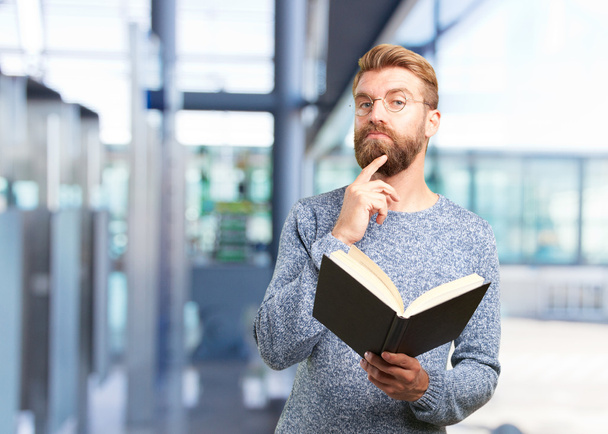 blond hipster man with a book - Photo, image