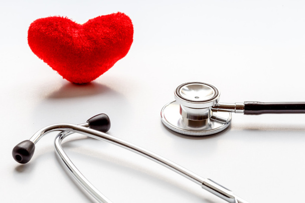 stethoscope on white background with plush heart - Zdjęcie, obraz