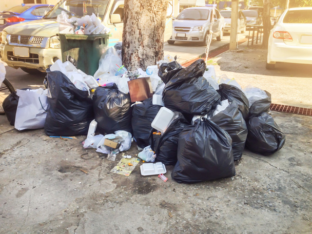 Trash garbage overwhelming at car park - Photo, Image