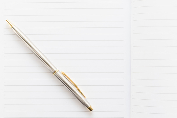 Pen and open notebook with blank page - Photo, Image