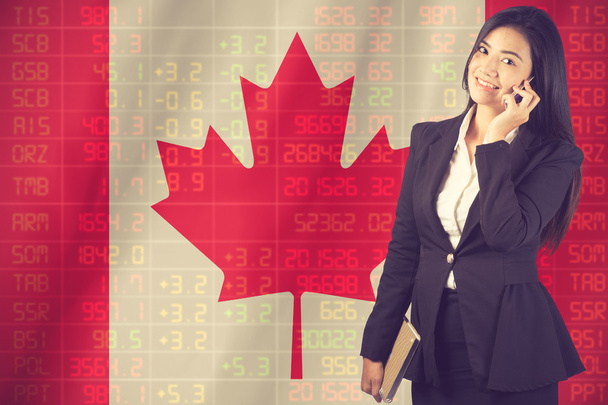 Nationalflagge Kanadas mit einer großen Anzeige der täglichen Aktienmarke - Foto, Bild