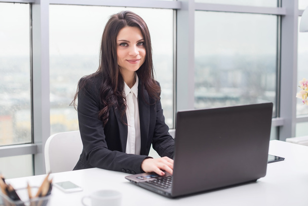 business woman with notebook in office, workplace - Zdjęcie, obraz
