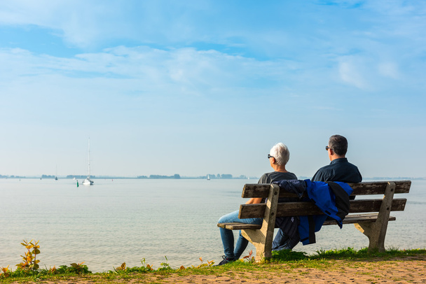 happy romantic couple enjoying sea view - Photo, Image
