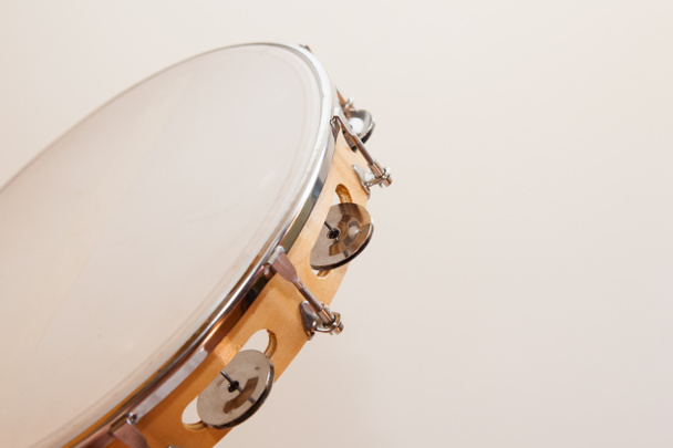 Horizontal Tambourine on Beige Background - Photo, Image