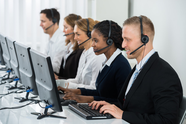 Businesspeople Working In Call Center  - Foto, Bild