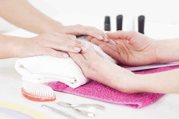 Woman receiving manicure  - Photo, image