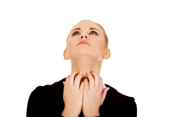 Young elegant woman scratching her neck - Foto, Bild