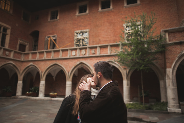 Loving couple posing in the old town - Photo, image