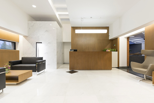 Reception area with wooden reception desk - Photo, Image