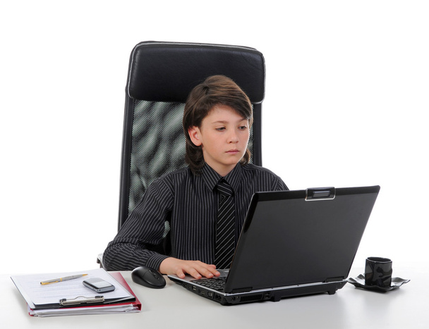 Young businessman using a laptop - Zdjęcie, obraz