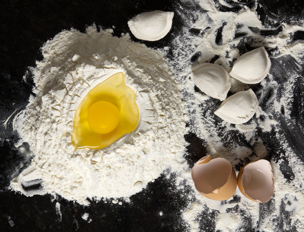 Egg and spoon flour dumplings - Fotoğraf, Görsel