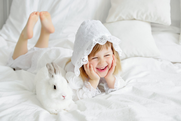 little girl with a rabbit - Photo, Image