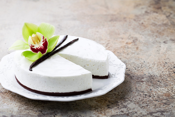 Vanilja ja suklaa juustokakku
 - Valokuva, kuva