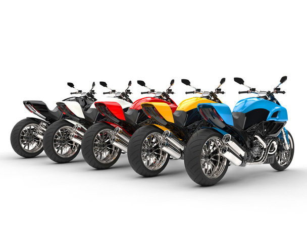 Спортивные мотоциклы в ряд - вид сзади - изолирован на белом фоне
 - Фото, изображение