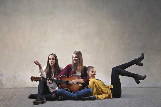 Friends playing the guitar - Фото, изображение