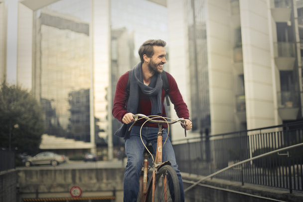 Man with bike - Foto, afbeelding