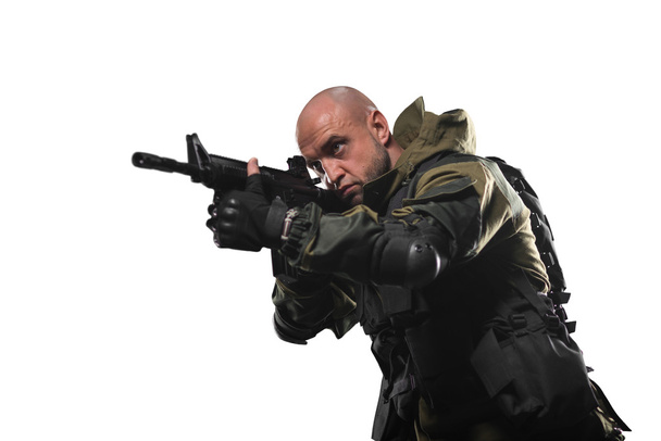 soldier man hold Machine gun on a white background - Foto, afbeelding
