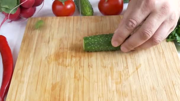 Cutting fresh cucumber - Footage, Video
