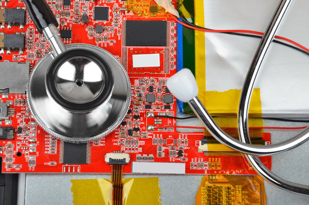 Motherboard and stethoscope - Photo, Image