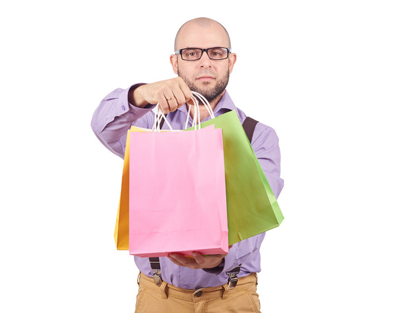 man  with colorful shopping paper bags - Foto, immagini