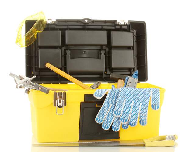 Open yellow tool box with tools isolated on white background - Foto, afbeelding