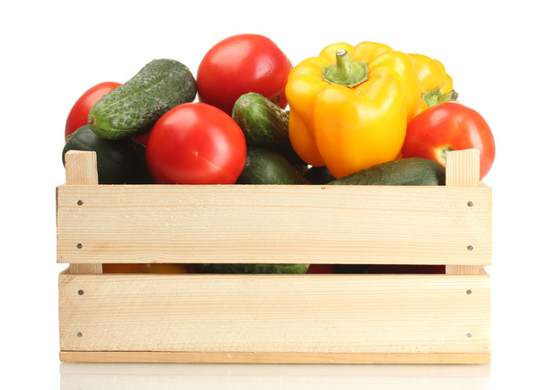 Fresh vegetables in wooden box isolated on white - 写真・画像