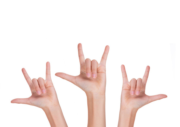 Три руки с пальцами, образующими знак любви
 - Фото, изображение