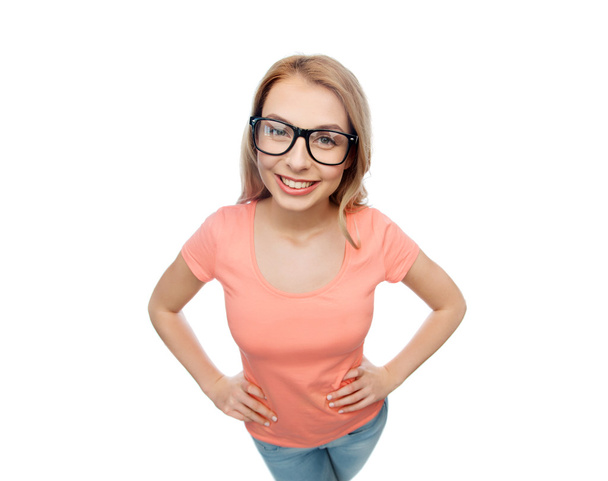 happy young woman or teenage girl in eyeglasses - Valokuva, kuva