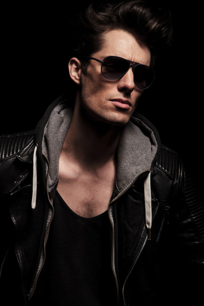 side view portrait of a cool man in leather jacket  - Photo, Image