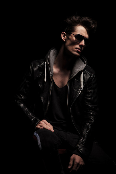 side view of dramatic young man in leather jacket - Photo, Image