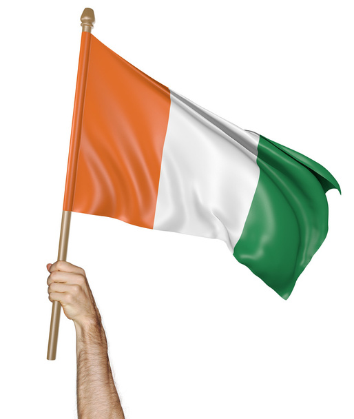 Mano ondeando orgullosamente la bandera nacional de Costa de Marfil, representación 3D
 - Foto, Imagen