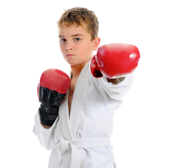 Young boy training karate. - Zdjęcie, obraz