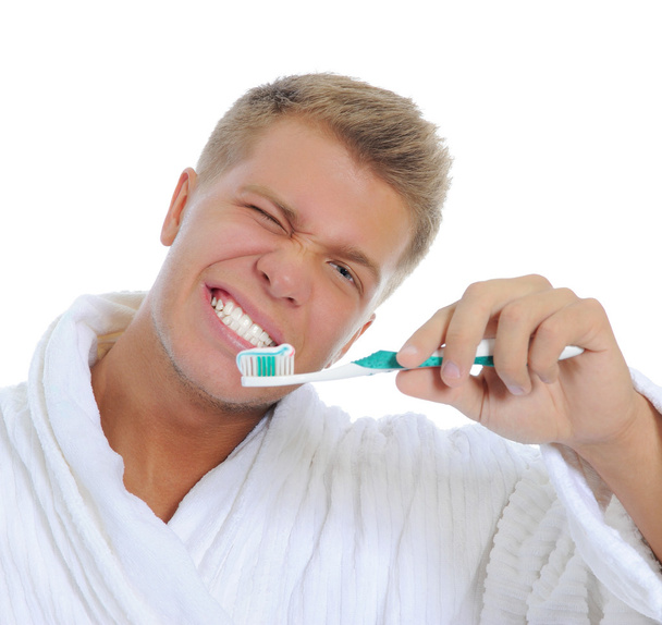 Man brushing his teeth - Fotó, kép