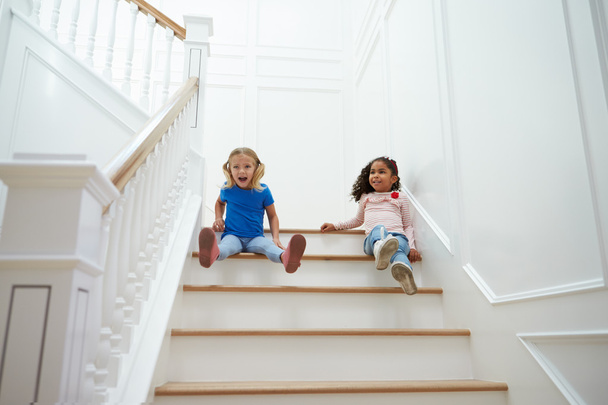 Girls Playing Game On Staircase  - Fotó, kép