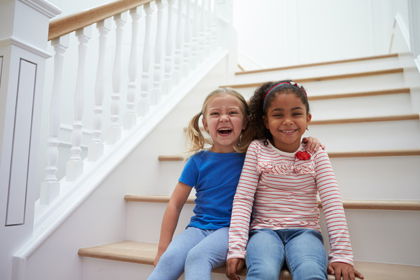 Two Girls Playing Game On Staircase - Fotó, kép