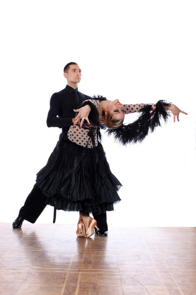 Latino dancers in ballroom against white background - Fotografie, Obrázek