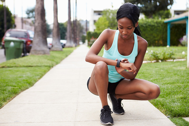 Young woman checking smart watch  - Photo, Image