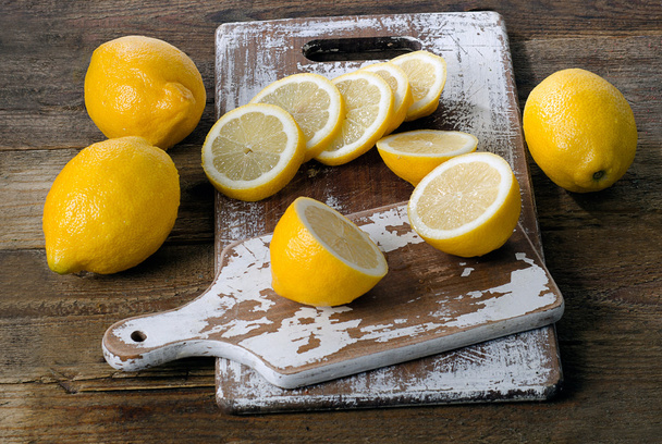 Fresh lemons on wooden table.  - Photo, Image