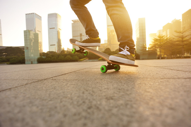 skateboarding at sunrise city - Фото, изображение