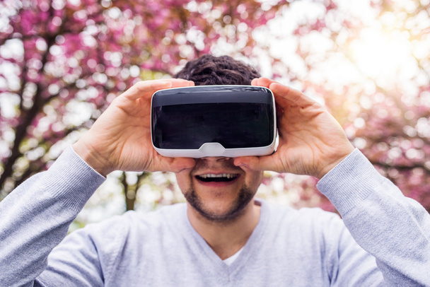 Man wearing virtual reality goggles   - Foto, Imagen