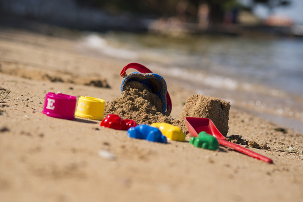 Műanyag gyerekjátékok, homokozó, vagy a strandon - Fotó, kép