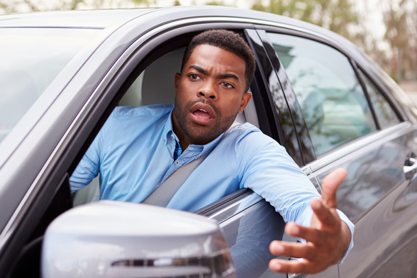 Frustrated male driver in car - Fotó, kép