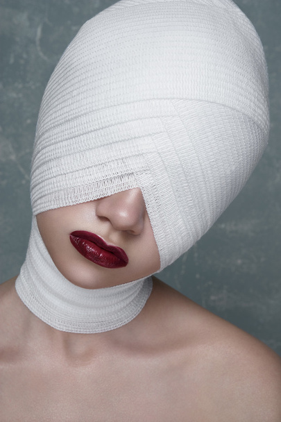 Patient with medical Bandage on her Eyes - Foto, Bild