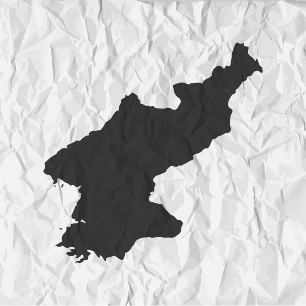 Észak-Korea Térkép fekete háttéren gyűrött papír - Vektor, kép