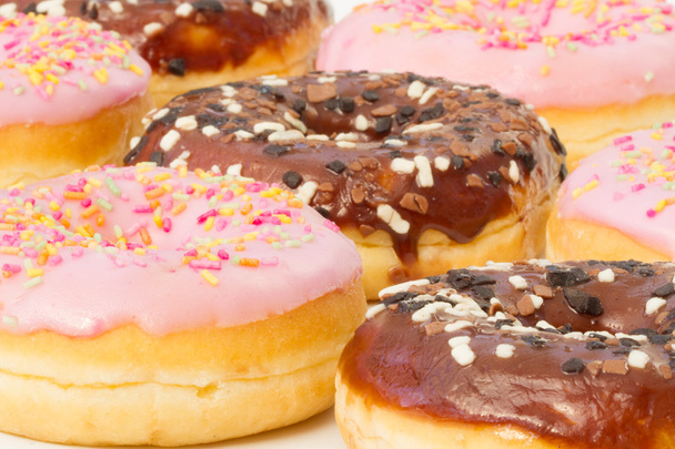 Chocolate And Pink Iced Donuts - Photo, Image