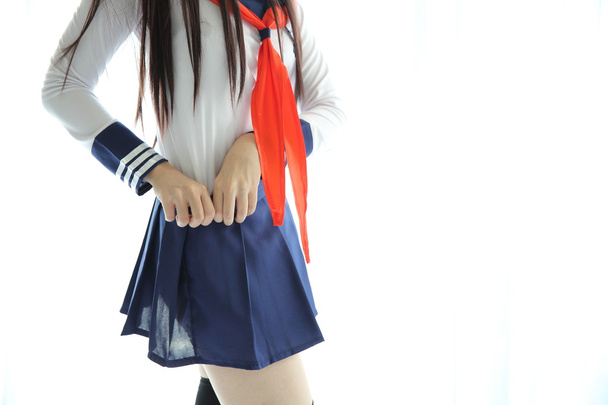 Азиатская школьница одевается
 - Фото, изображение