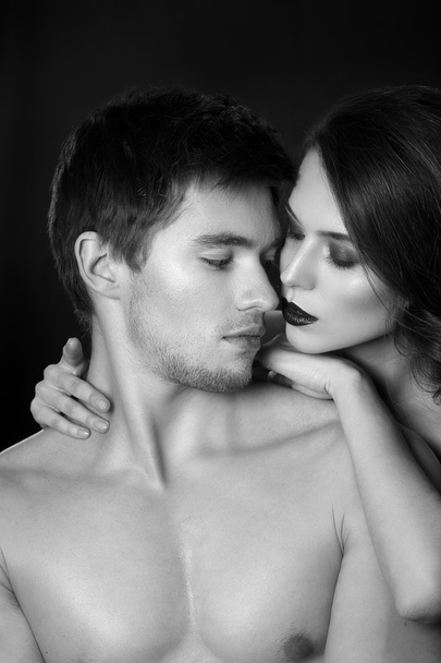 Sexy beauty couple.Kissing couple portrait.Sensual brunette woman in underwear with young lover, passionate couple foreplay closeup - Foto, Imagen