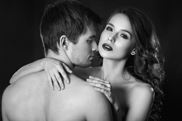 Sexy beauty couple.Kissing couple portrait.Sensual brunette woman in underwear with young lover, passionate couple foreplay closeup - Foto, Imagem